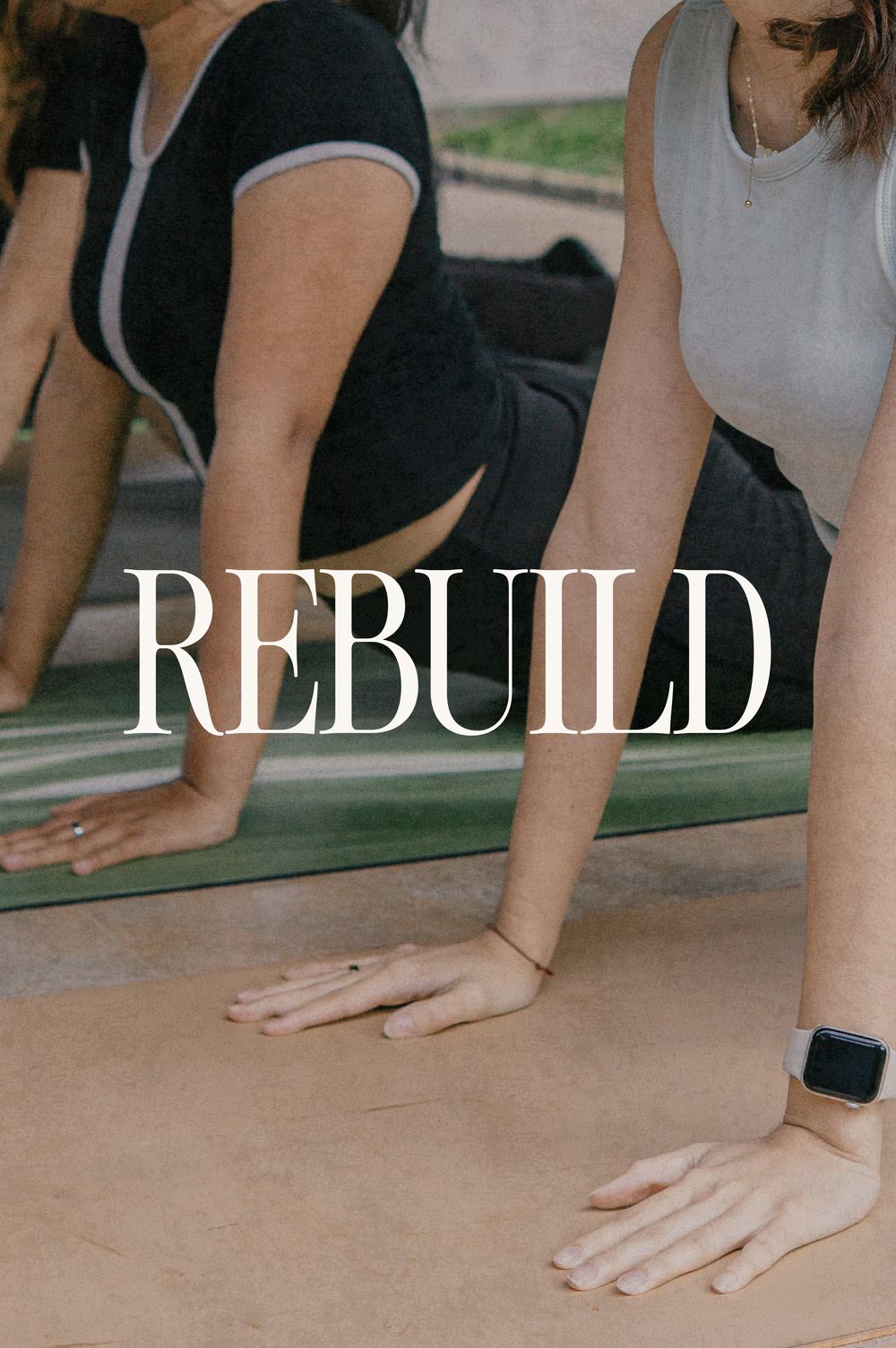 Rebuild: two women stretching on yoga mats