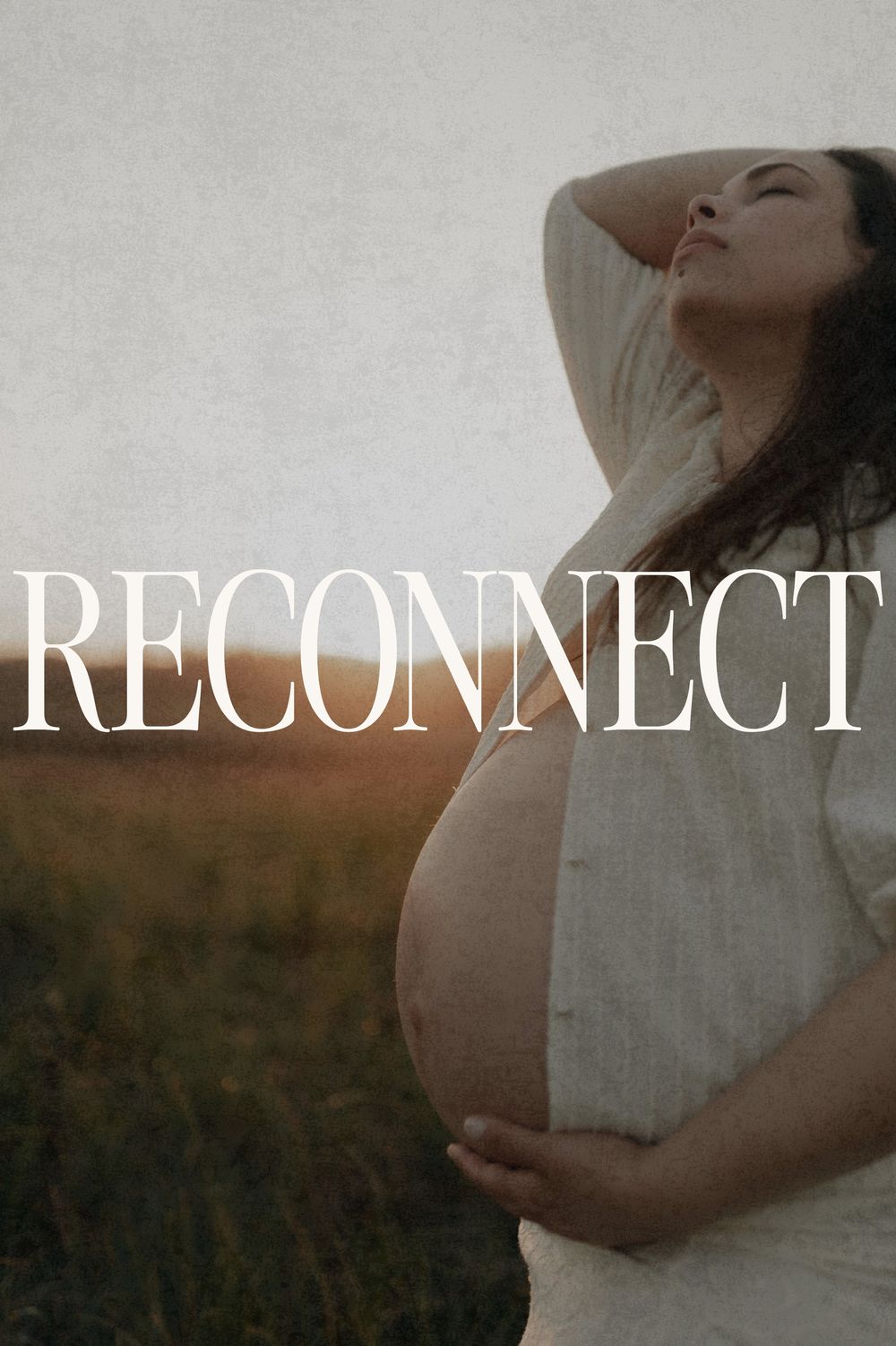 Reconnect: a pregnant woman in a field at sunset