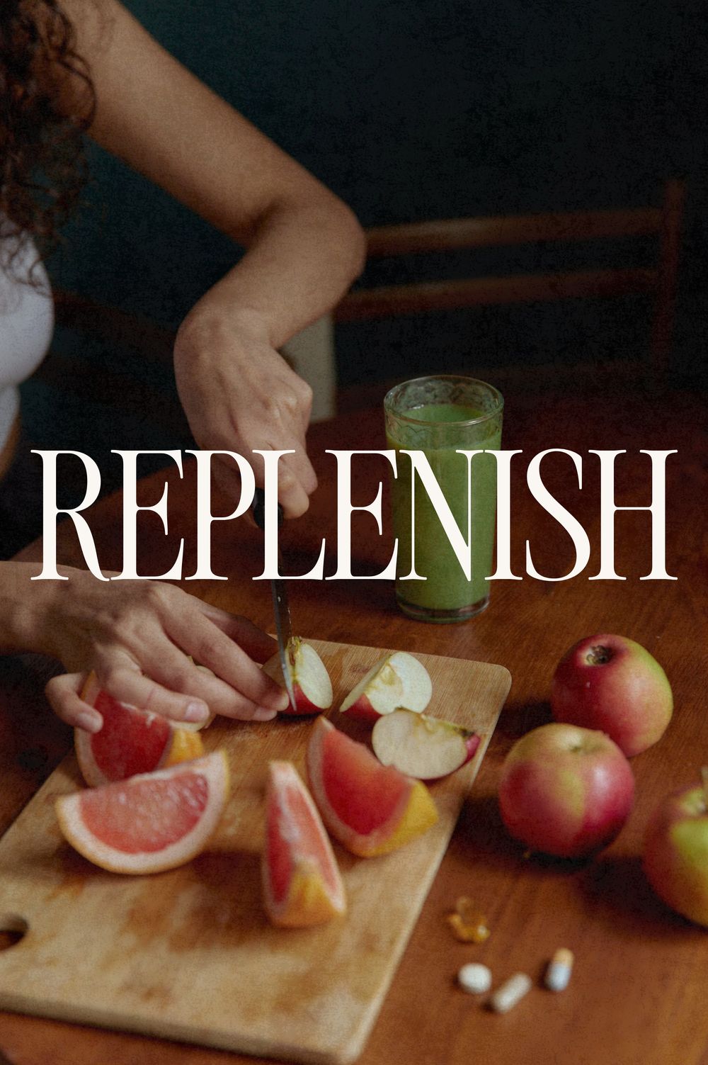 Replenish: a woman slicing fruit beside a green smoothie